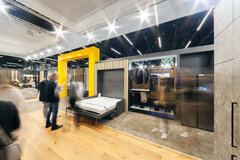 Schachermayer Messestand bei der küchenwohntrends 2025 mit gelbem Eingangsportal