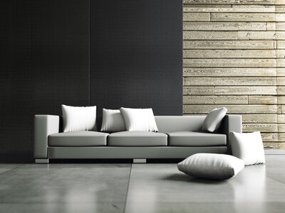 graues Sofa vor Holzwand SIBU DESIGN Platten